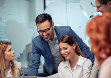 Successful team.Group of young business people working together in modern office.